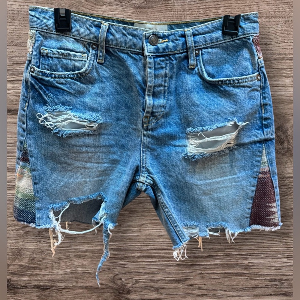 Free People Distressed Denim Shorts. Boho Tapestry details. Size 24